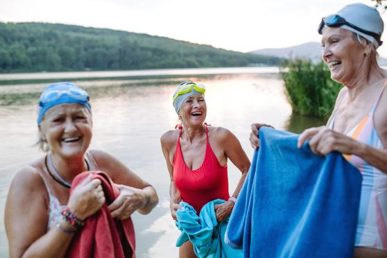 A group of women toweling off after swimming